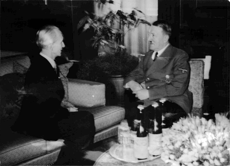 Adolf Hitler talking to foreign minister László Bárdossy (Hungary) in the Führerbau in Munich